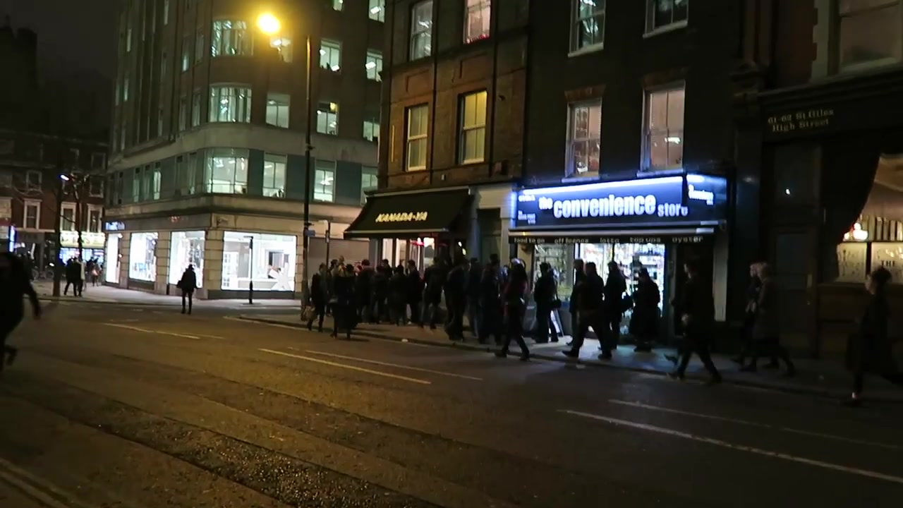 Kanada-Ya and neighbouring shopfronts on St Giles High Street at night