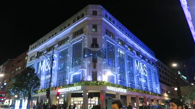 Marks and Spencer building illuminated in blue for Christmas 2015