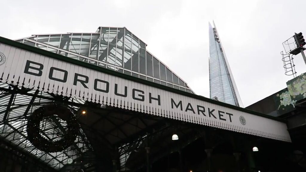 Borough Market entrance with The Shard rising behind it