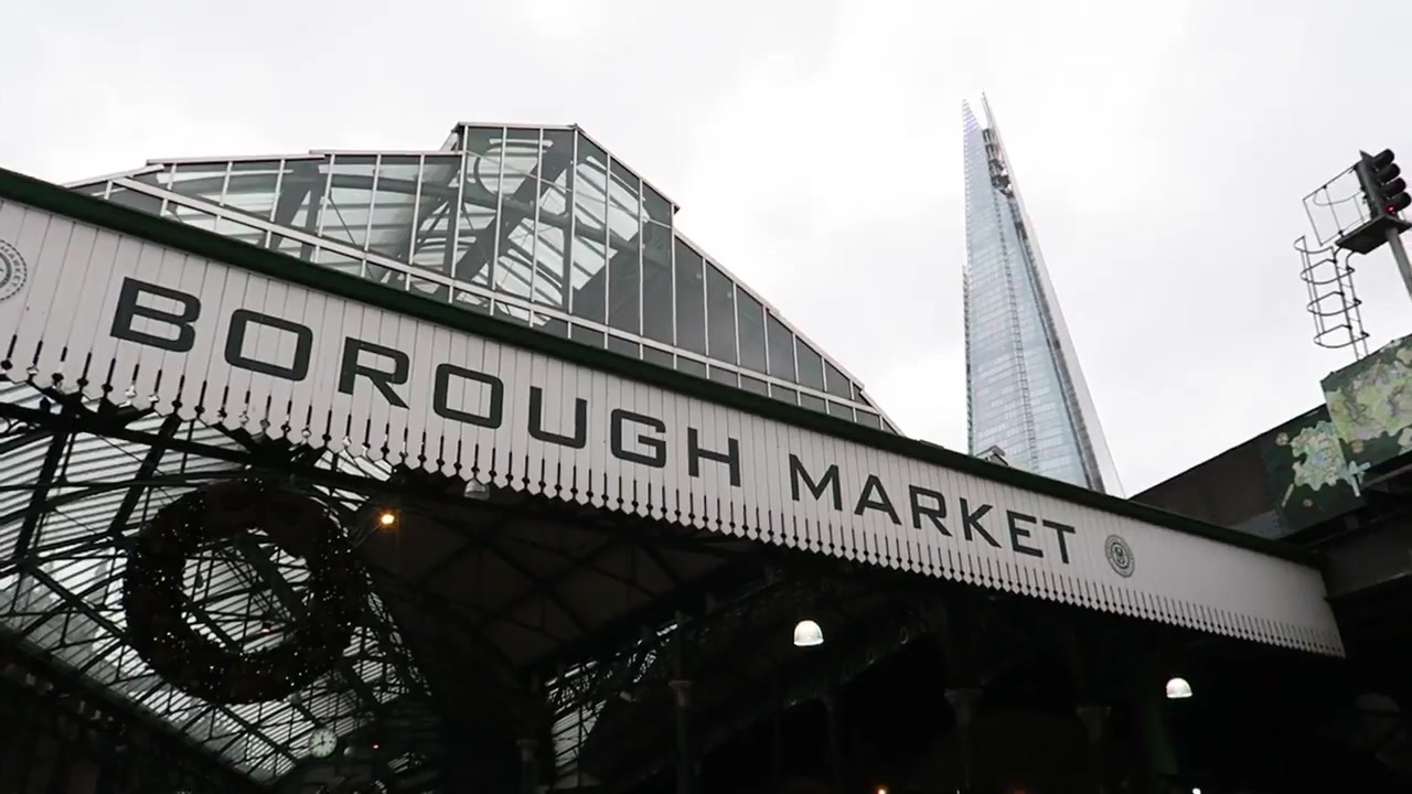 Borough Market entrance with The Shard rising behind it