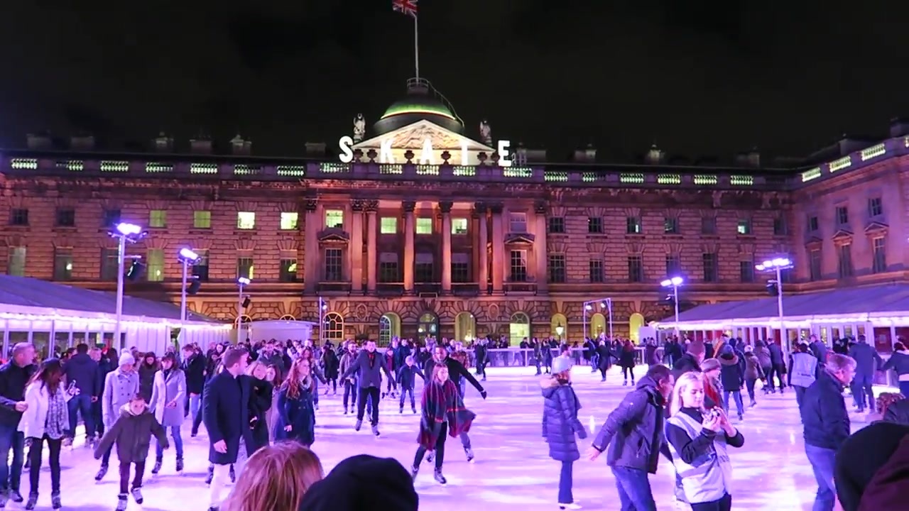 Skaters on the illuminated ice rink in the Somerset House courtyard in December 2015.