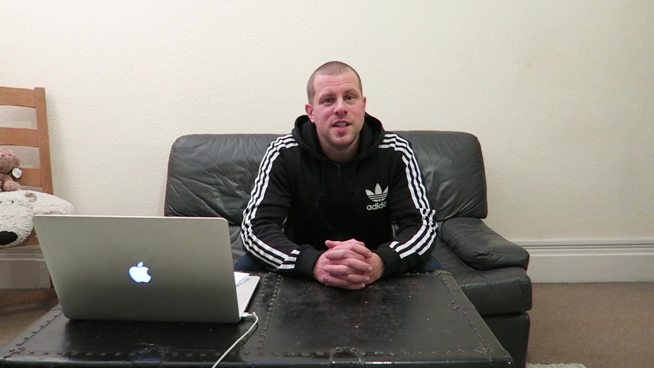Barry introducing Vlogmas day three beside a laptop at home