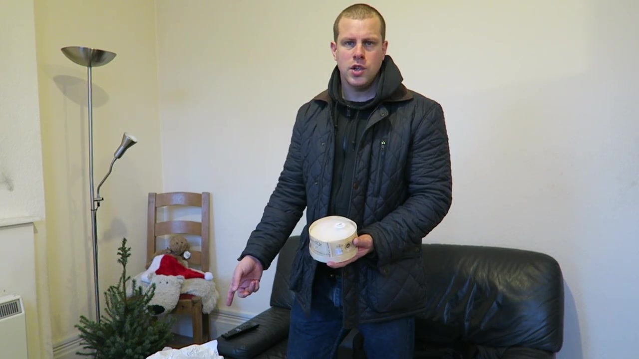 Barry holding the boxed Mont d’Or cheese at home