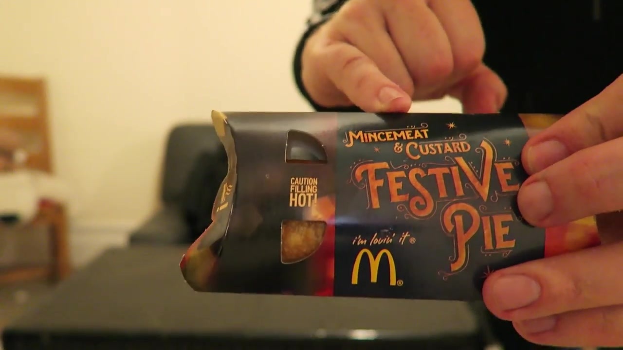 McDonald’s Mincemeat and Custard Festive Pie box held towards the camera