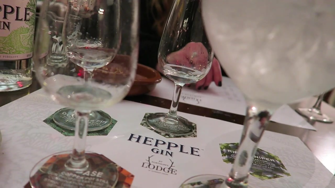 Drinks and glassware on a table in the Fortnum & Mason Lodge at Somerset House.