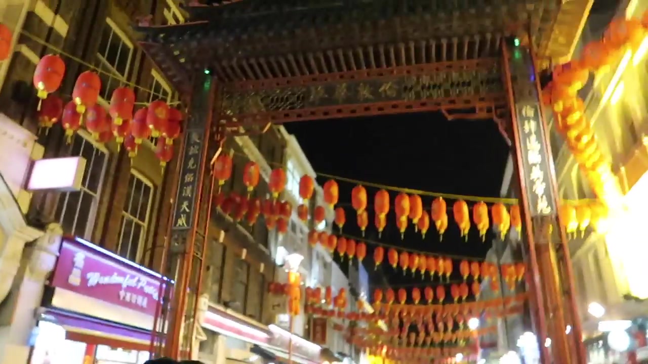 Chinatown gate and red Lunar New Year lanterns over Gerrard Street in London