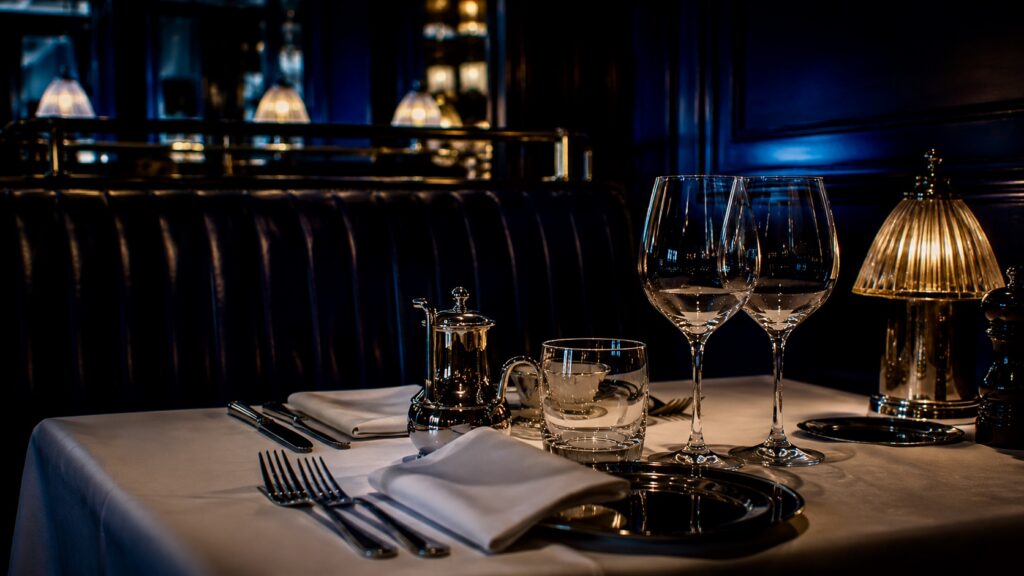 Elegant dining booth in warm tones Roberts London