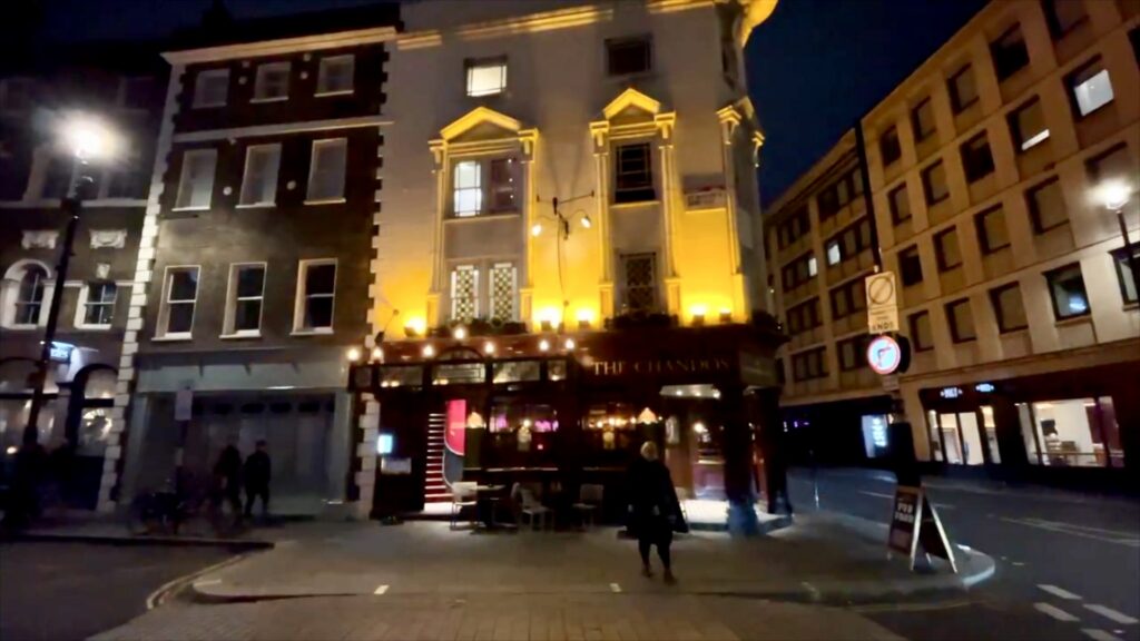 The Chandos pub near Trafalgar Square illuminated at night during an evening in central London