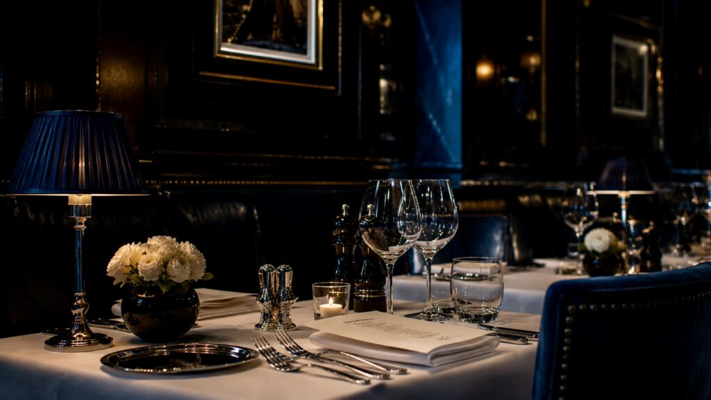 dining in soft glow Roberts London