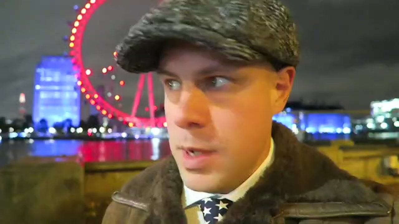 Barry Roberts beside the illuminated London Eye before the Oxford Street journey