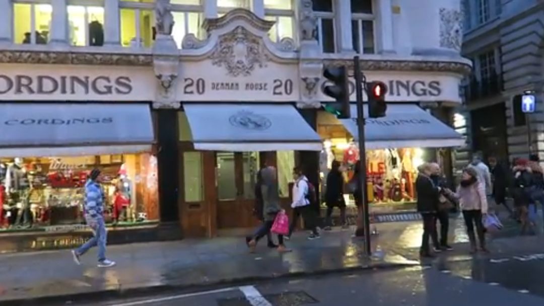 Cordings of Piccadilly shopfront at Denman House on a wet London evening