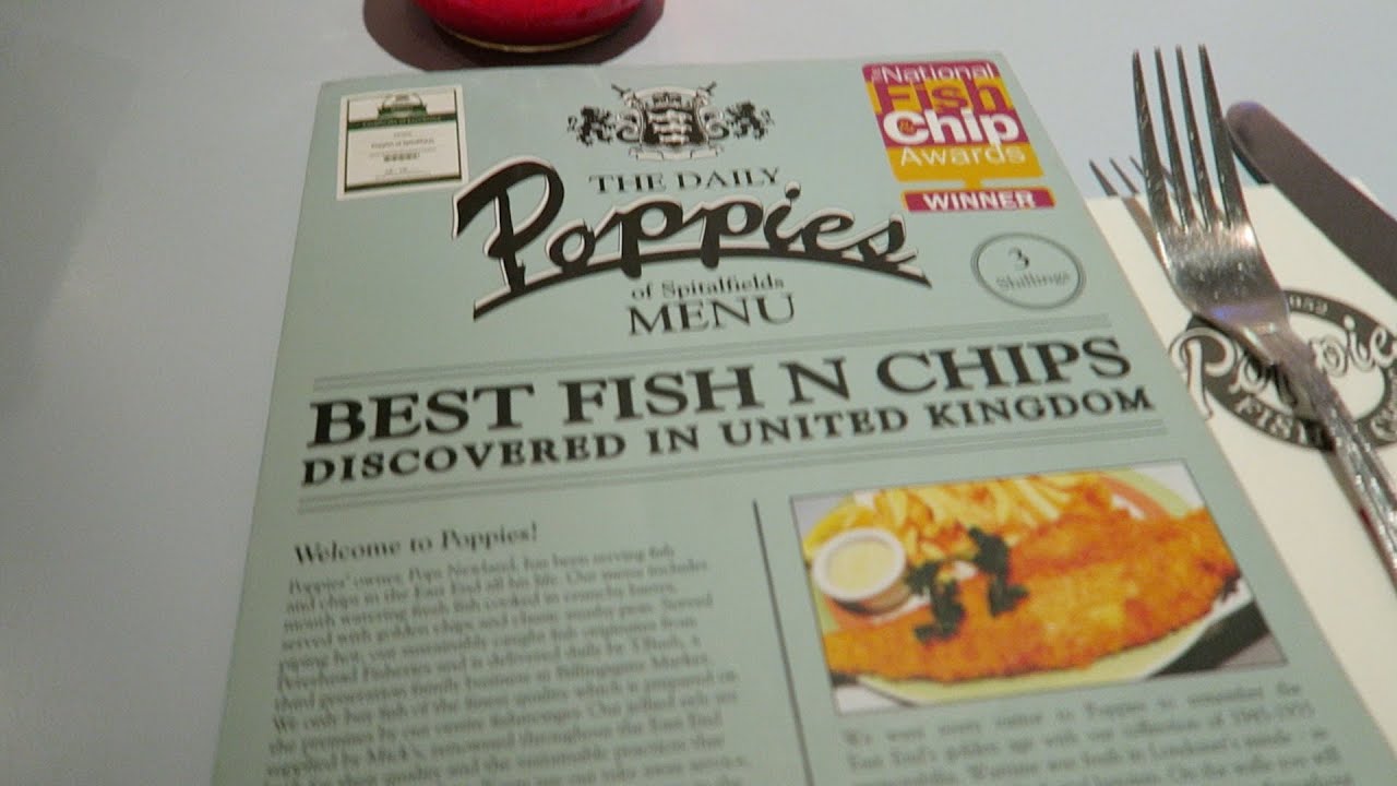 Poppies of Spitalfields fish-and-chips menu on a restaurant table in the 2016 Roberts London film.