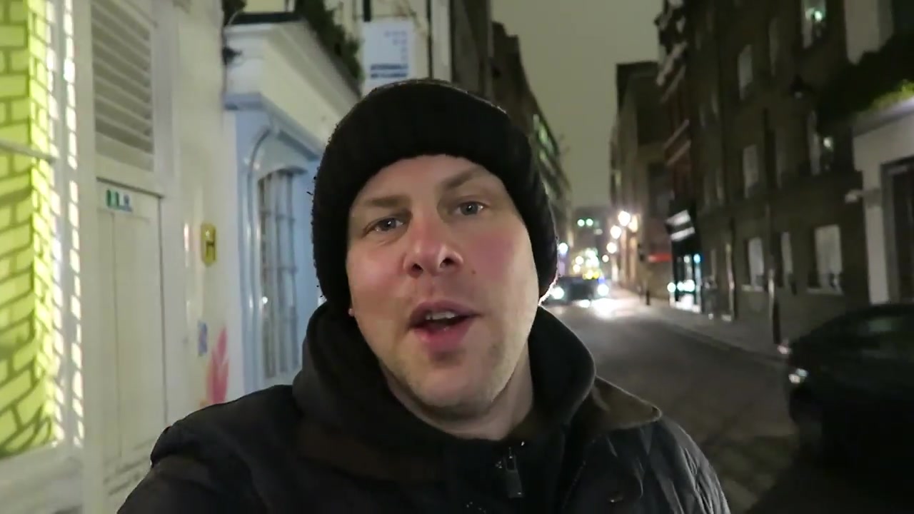 Barry Roberts walking through St Giles towards Kanada-Ya on a winter evening in 2015