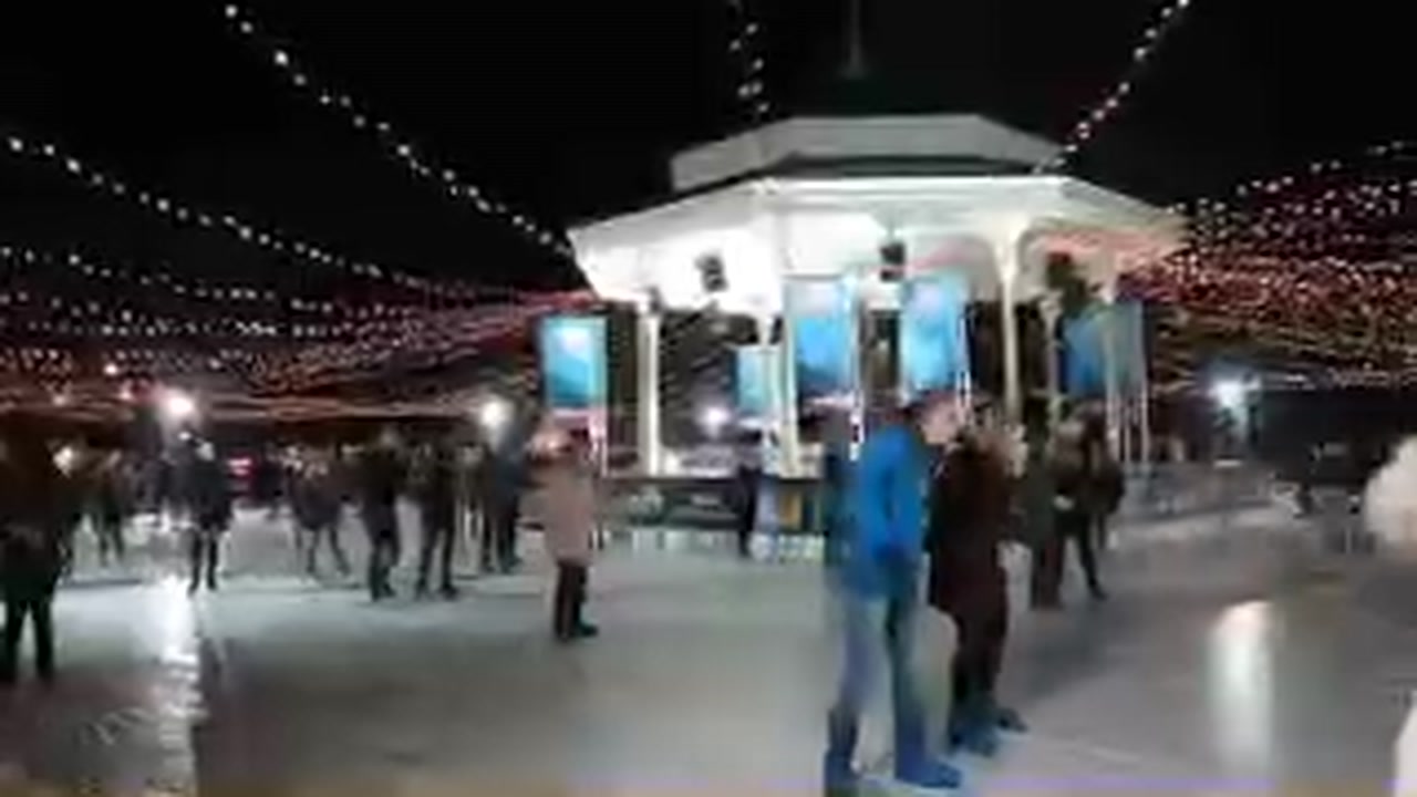 Ice skaters circling the illuminated Victorian bandstand at Hyde Park Winter Wonderland 2015