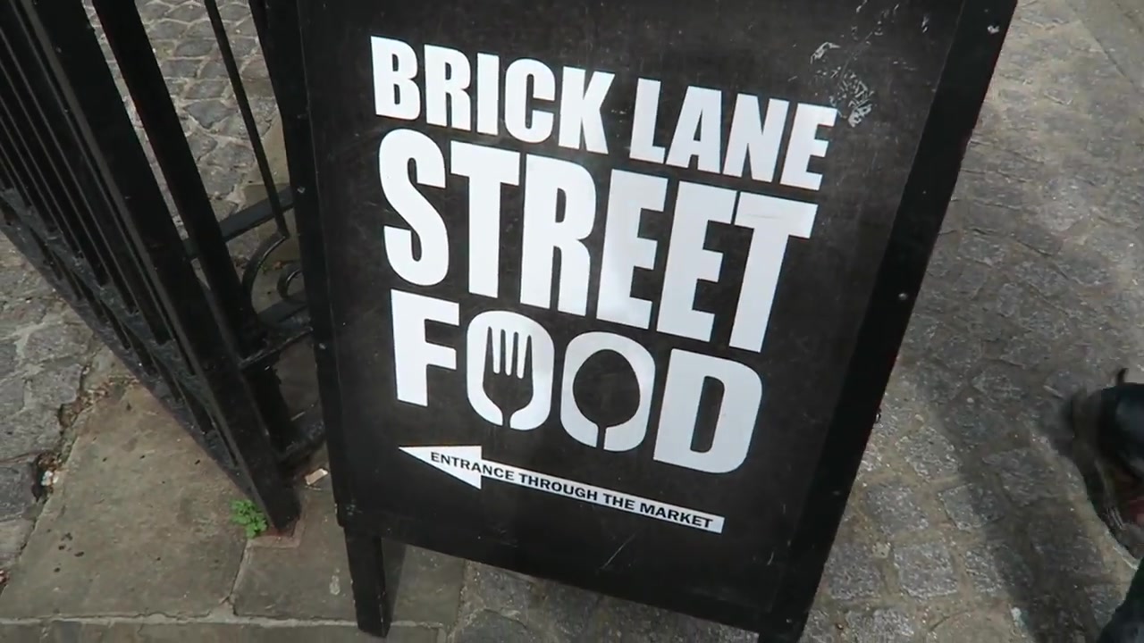 Brick Lane Street Food market sign in East London