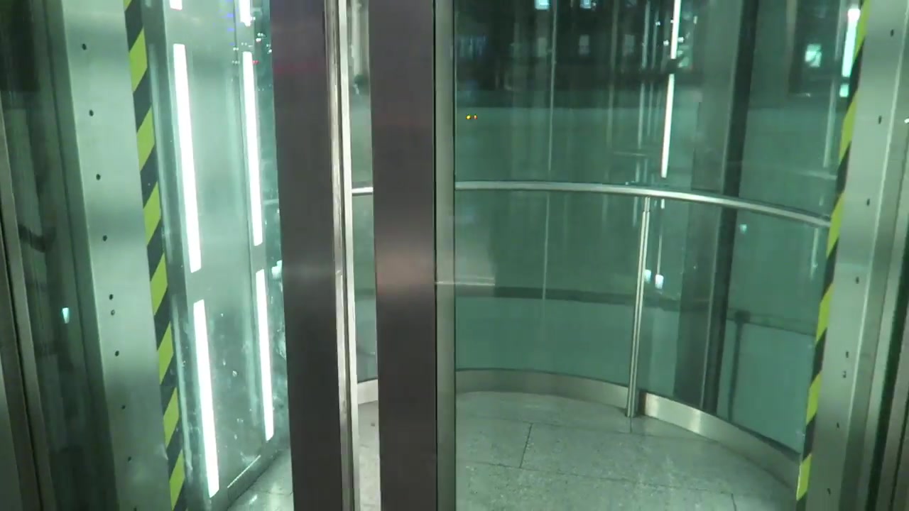 Interior of the glass lift descending to Café in the Crypt in London