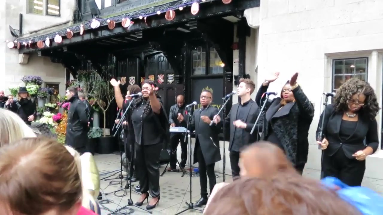 London Community Gospel Choir performing outside Liberty London in November 2014
