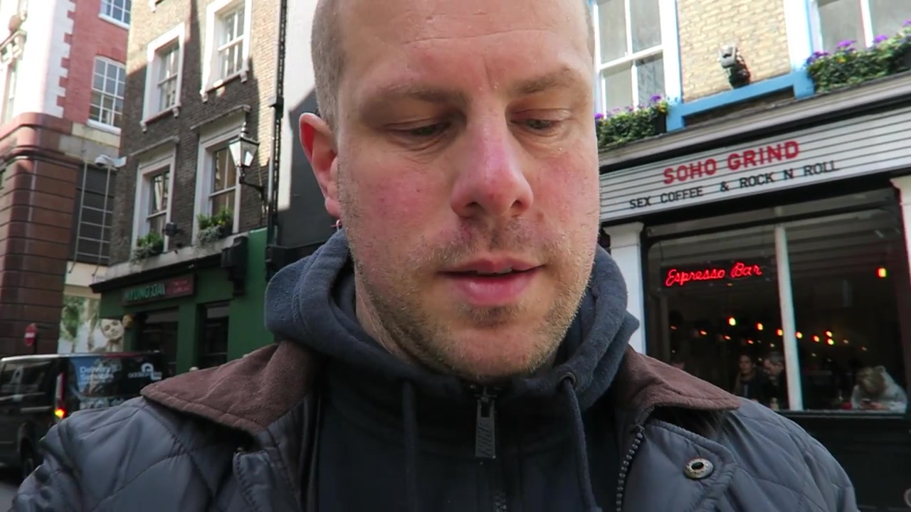 Barry standing outside Soho Grind during a 2016 walk through Soho