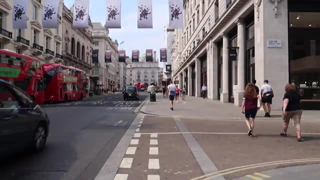 Barry Roberts walking north from Trafalgar Square towards Regent Street in 2018