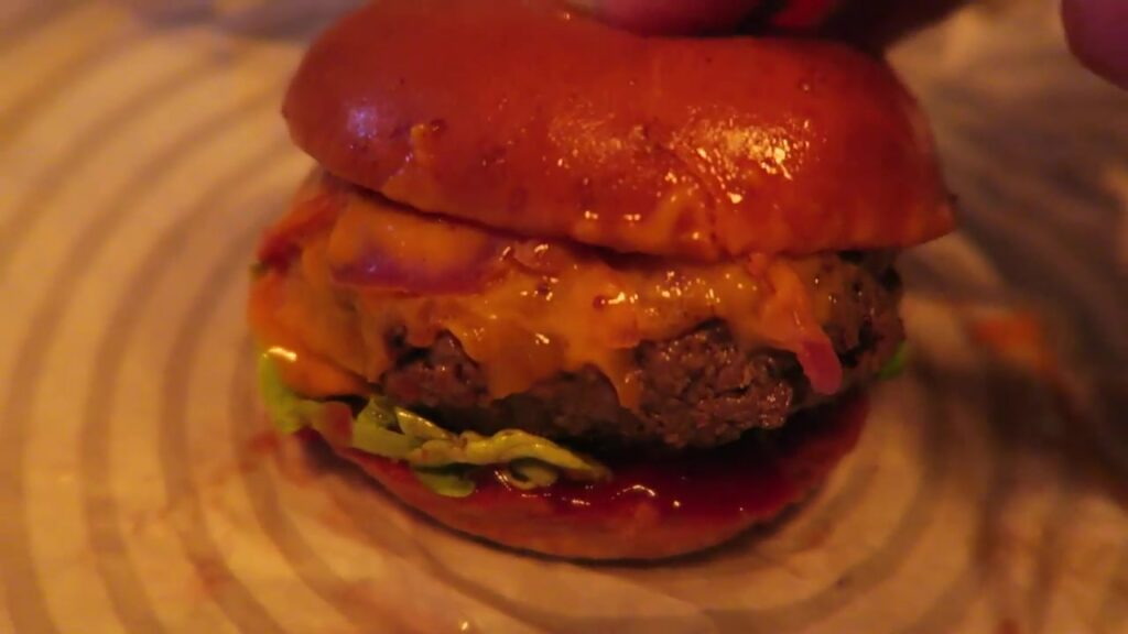 Ari Gold cheeseburger with lettuce, tomato and sauce at Patty & Bun