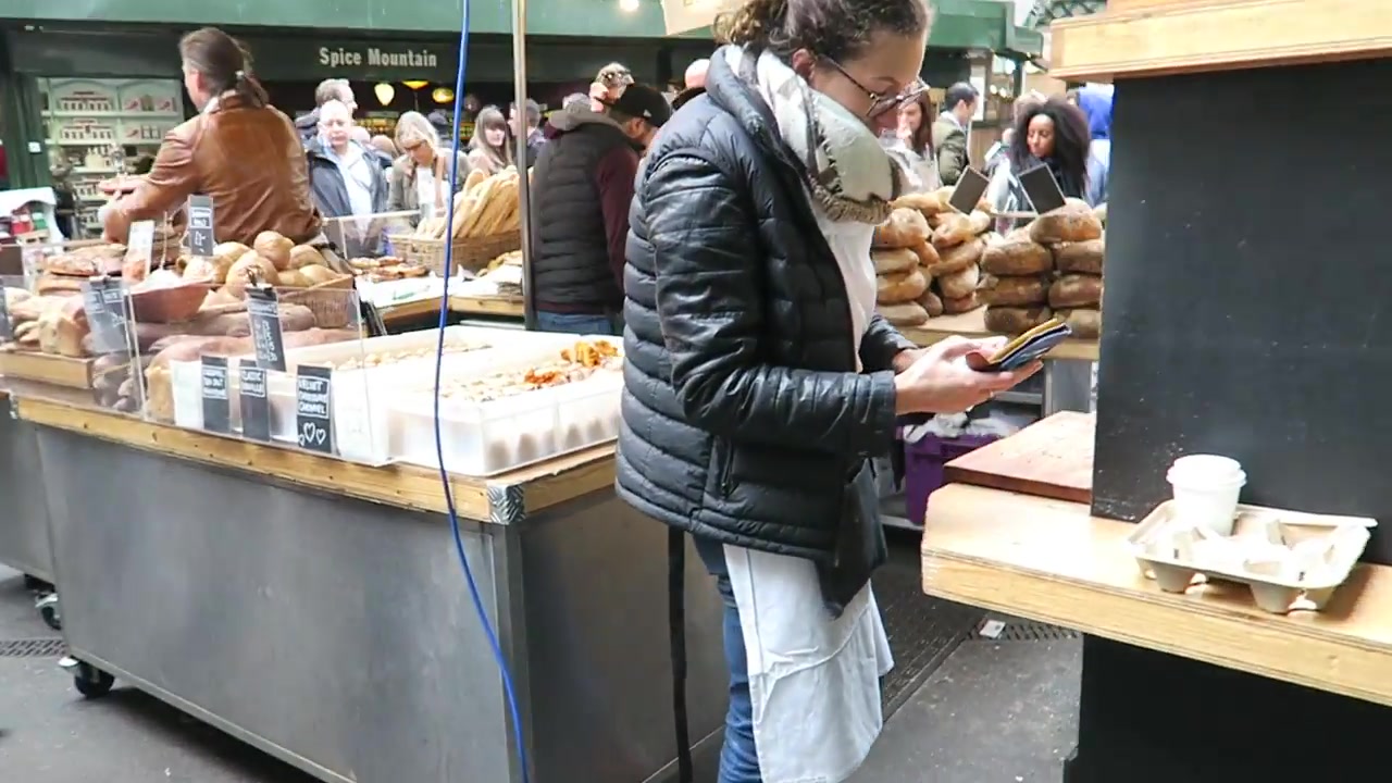Bread and pastries arranged on a Borough Market bakery counter