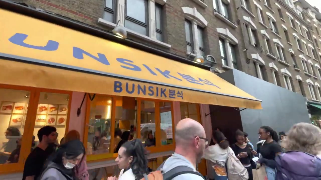 Customers queuing outside the original Bunsik near Leicester Square in June 2022.