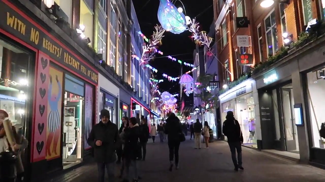 Colourful Christmas decorations suspended above Carnaby Street in 2019
