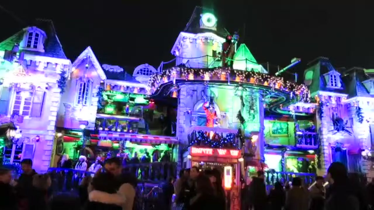 Colourfully illuminated fairground attraction at Winter Wonderland London in 2014