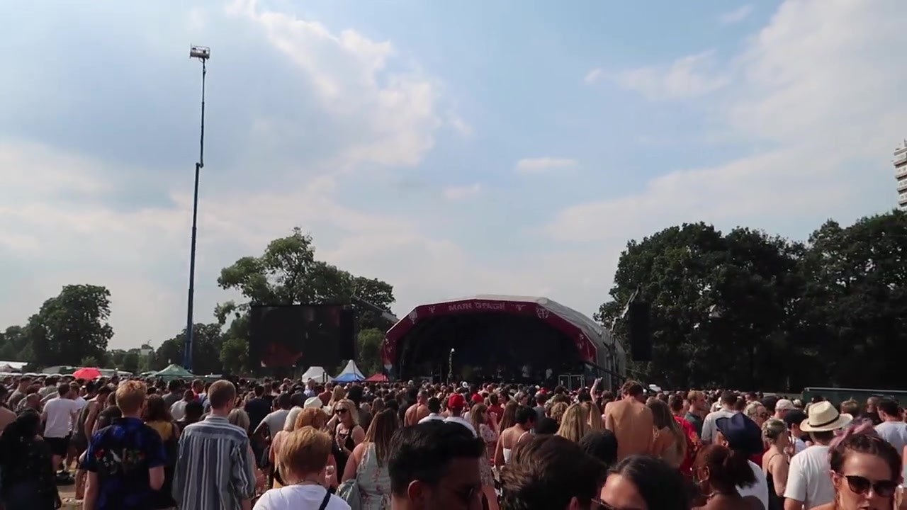 Visitors crossing the busy Lambeth Country Show grounds in Brockwell Park