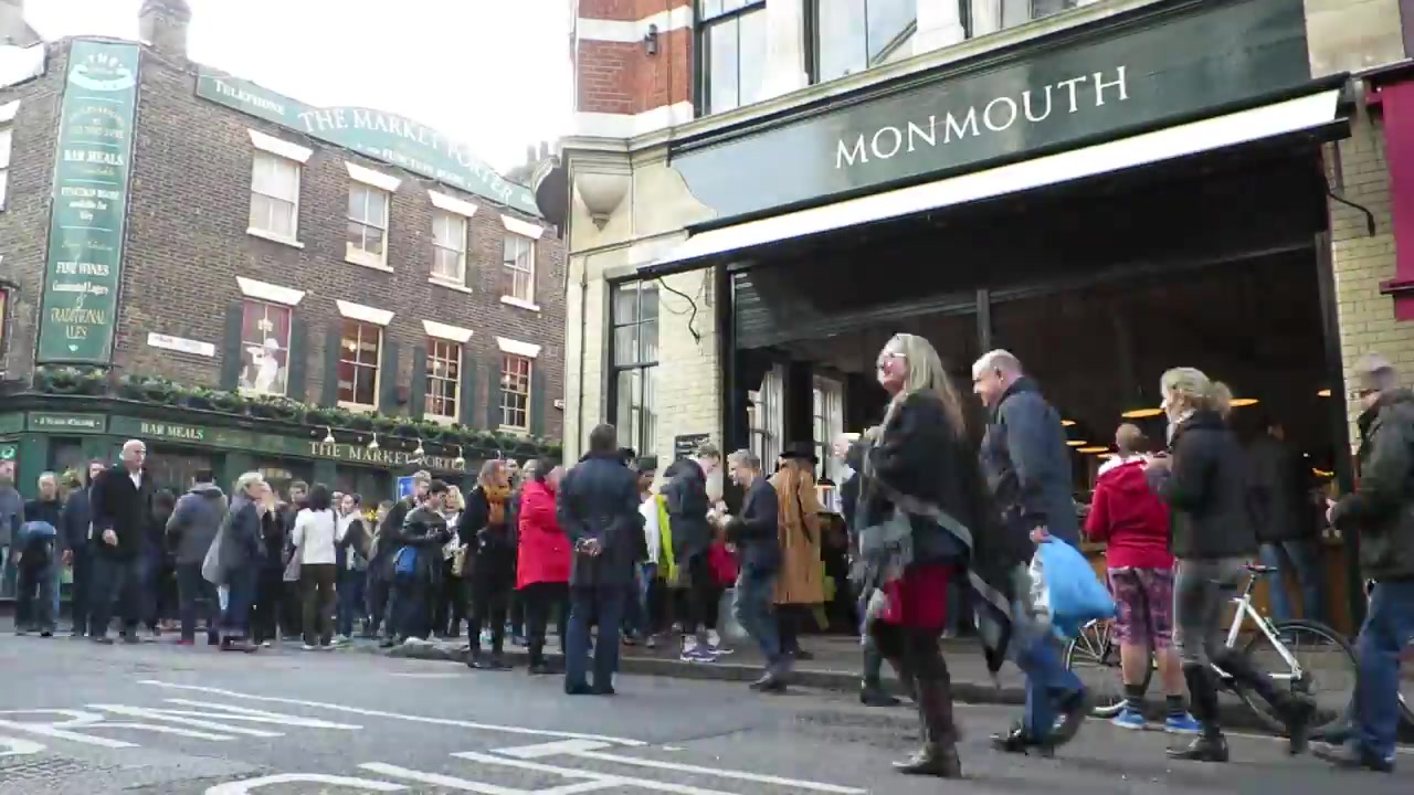 Customers outside Monmouth Coffee on Park Street at Borough Market