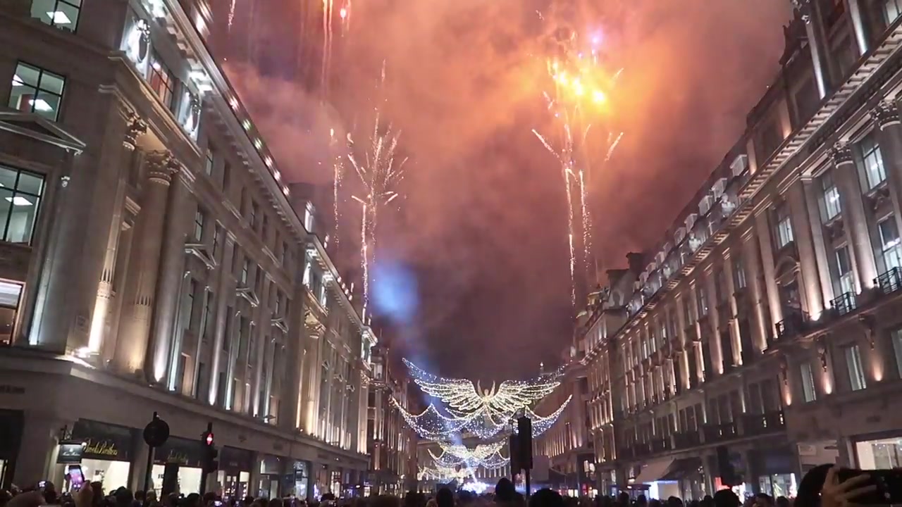 Fireworks above the illuminated Regent Street Spirit of Christmas angels