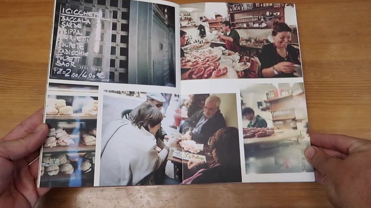 Photographic pages showing Venetian life inside the POLPO cookbook
