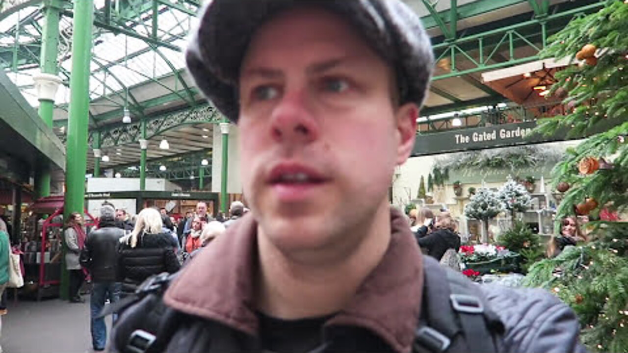 Barry Roberts beneath the green iron roof inside Borough Market during the 2017 shopping trip.