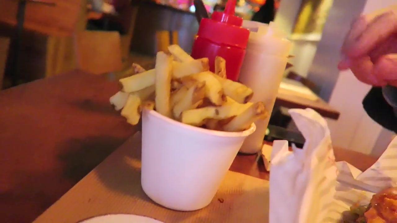 Cup of chips seasoned with chicken-skin salt at Patty & Bun