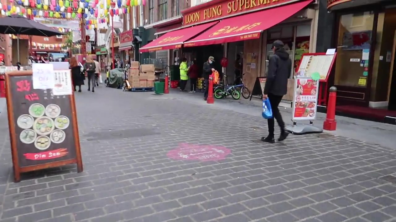 Chinatown street and restaurants during a 2020 London walk