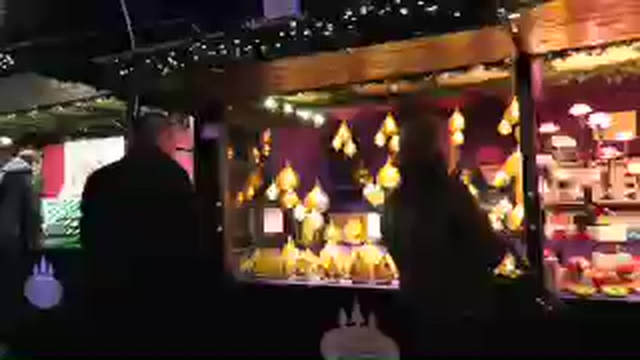 Illuminated candle and decoration stall at Hyde Park Winter Wonderland 2015