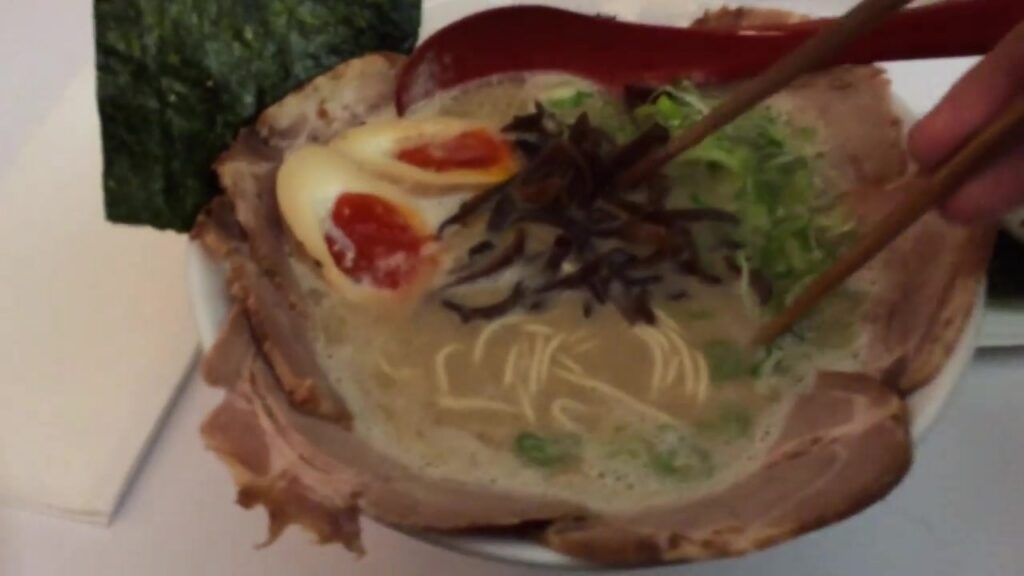 Bowl of Kanada-Ya tonkotsu ramen with pork egg seaweed and spring onion in 2015