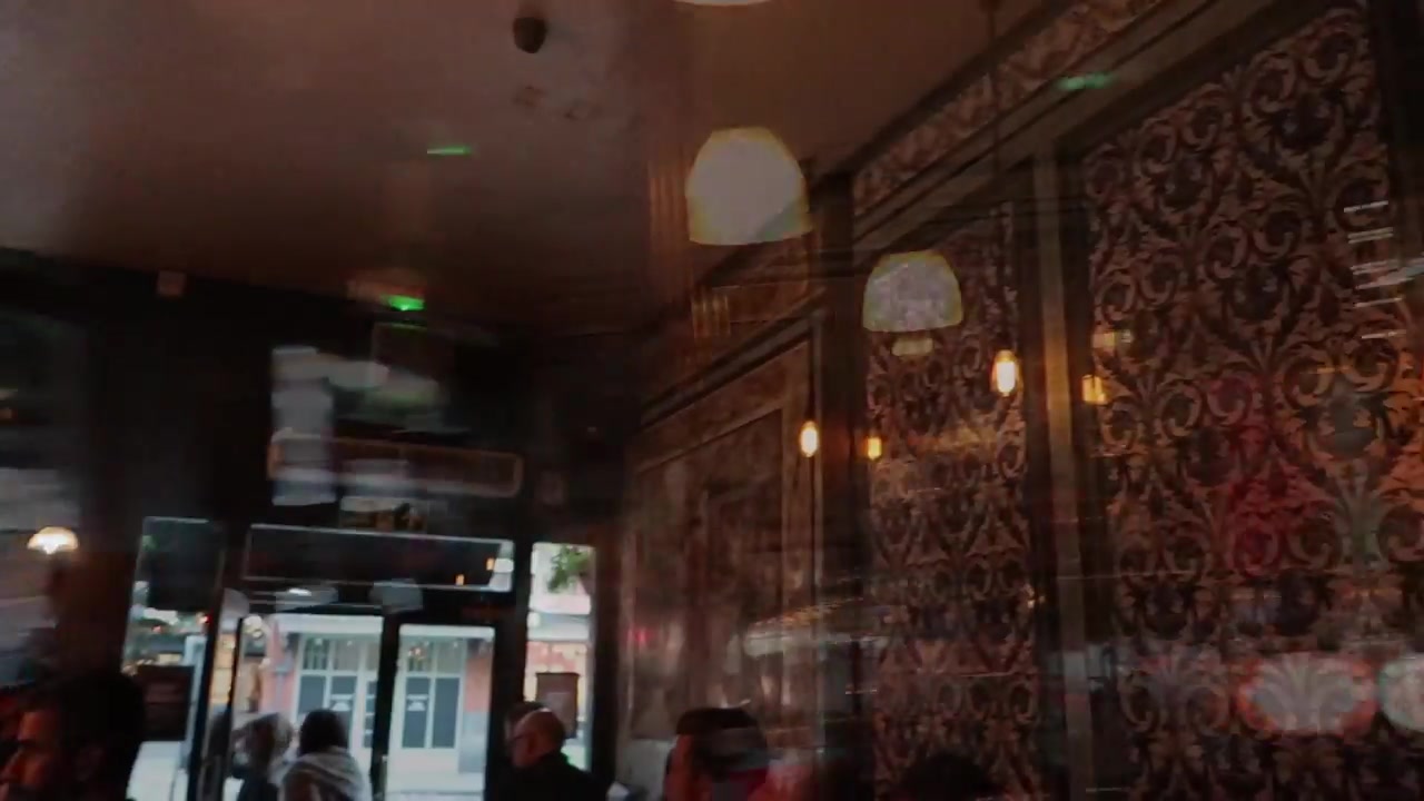 Ornate Victorian patterned tiles inside the Ten Bells pub