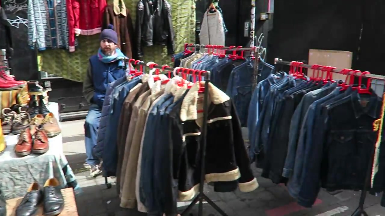 Vintage jackets and boots displayed at Brick Lane Sunday Market