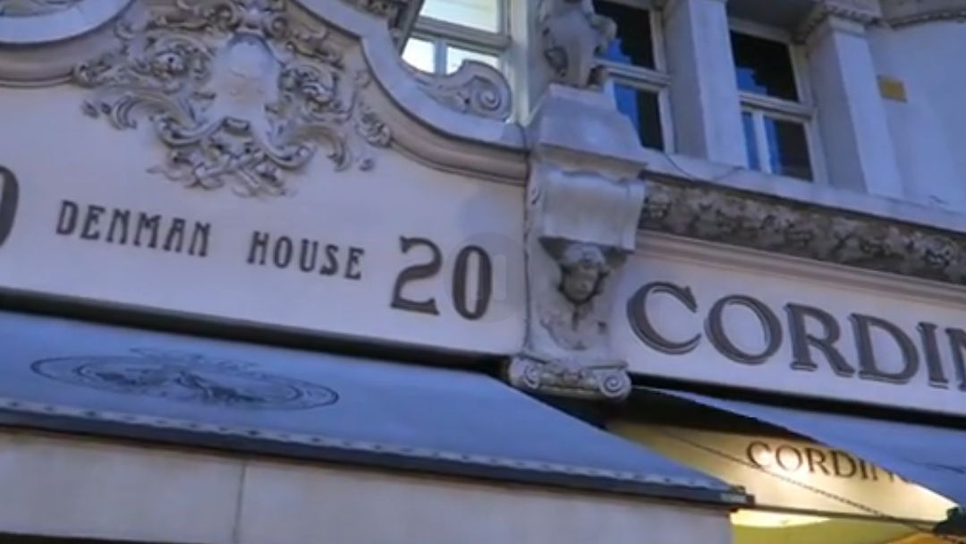 Denman House stonework and Cordings shopfront lettering in Piccadilly