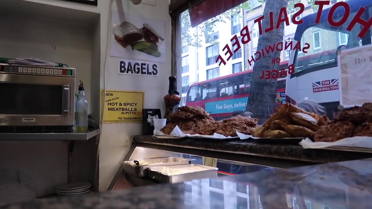 Bagels and prepared food displayed inside Gaby’s Deli on Charing Cross Road