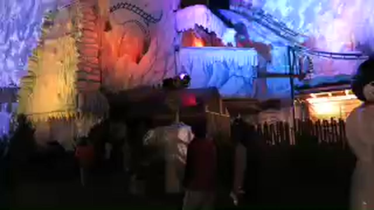 Illuminated frozen castle inside the Magical Ice Kingdom at Winter Wonderland 2015