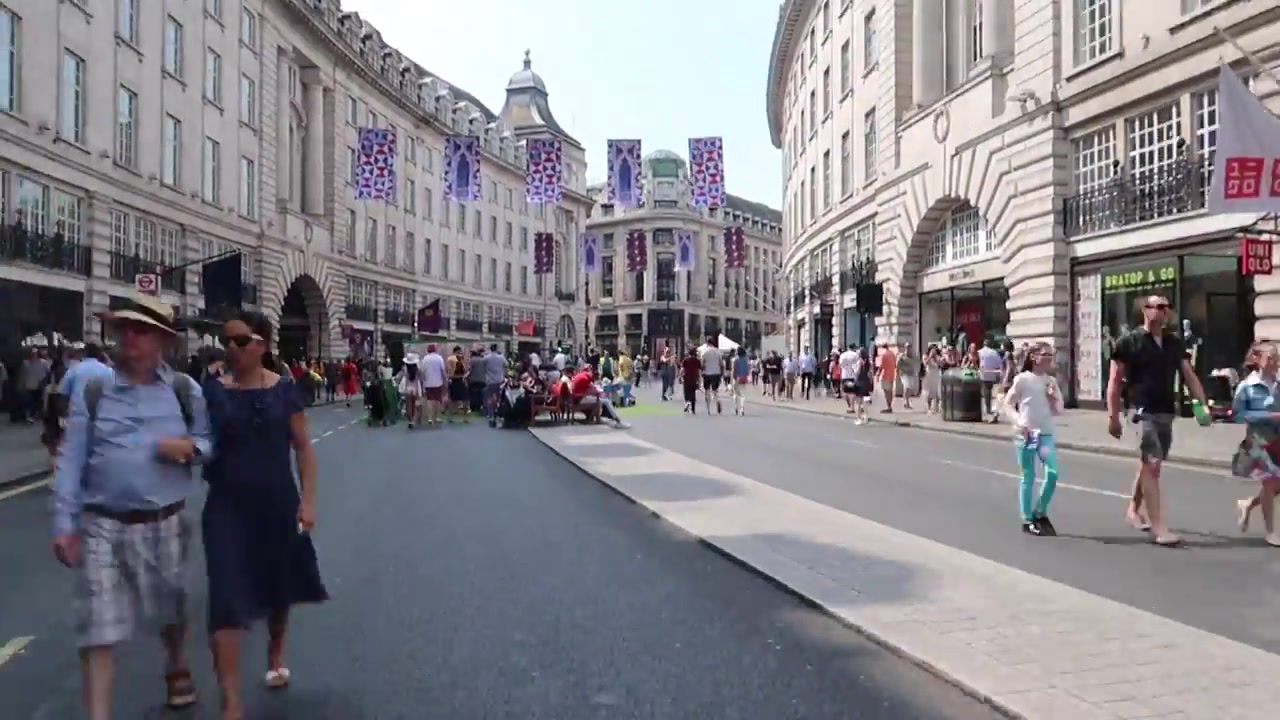 Pedestrians walking along traffic-free Regent Street during Summer Streets 2018