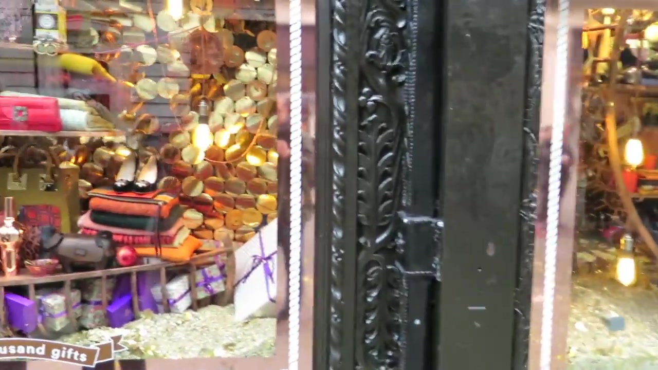 Accessories and decorative objects in a colourful Liberty London Christmas display