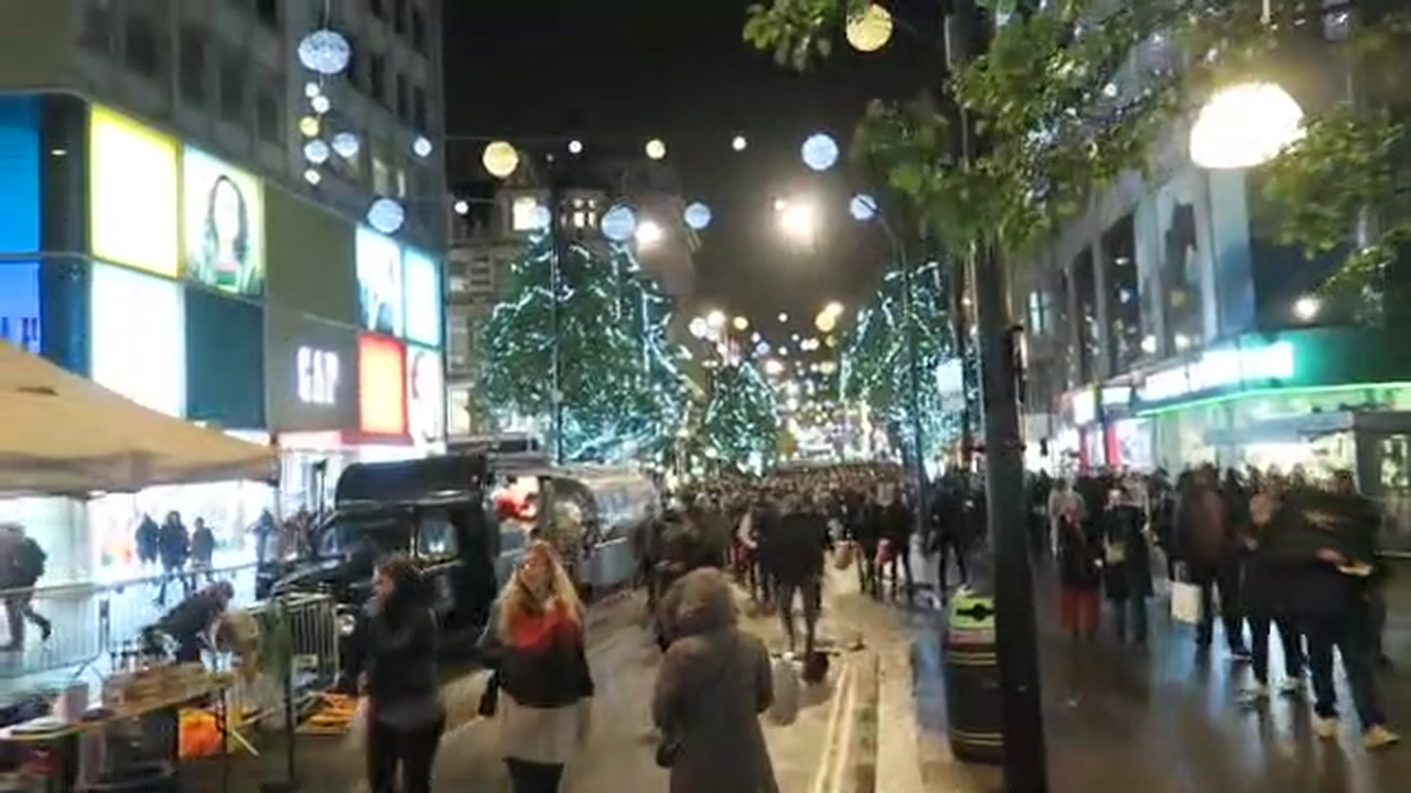Oxford Street filled with pedestrians beneath the Christmas lights in 2016