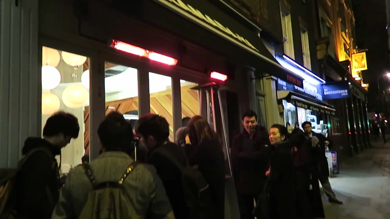 Evening queue outside Kanada-Ya on St Giles High Street in London in February 2015