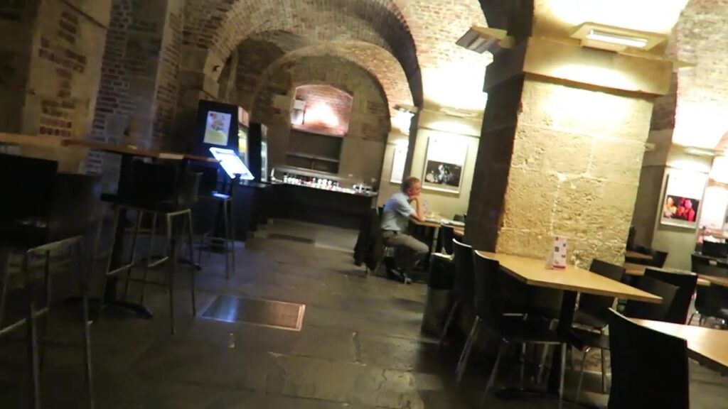 Vaulted brick interior of Café in the Crypt beneath St Martin-in-the-Fields in London