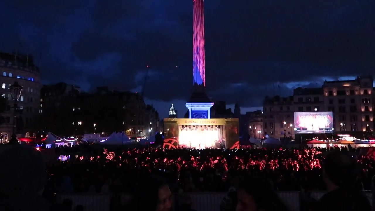 Nelson’s Column illuminated above the Diwali festival crowd in Trafalgar Square