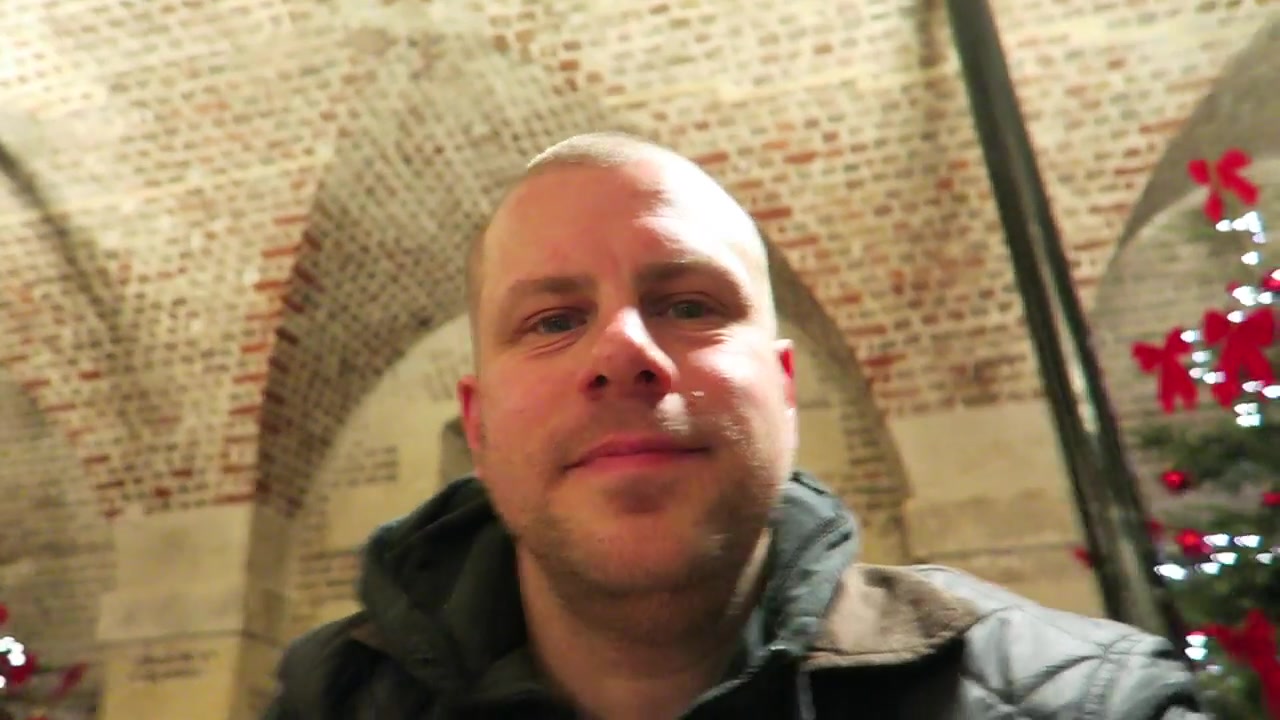 Barry Roberts having coffee beneath the brick vaults of Café in the Crypt