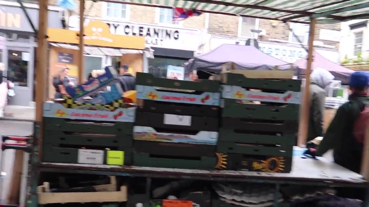 Fresh fruit and vegetables displayed at a Leather Lane Market stall